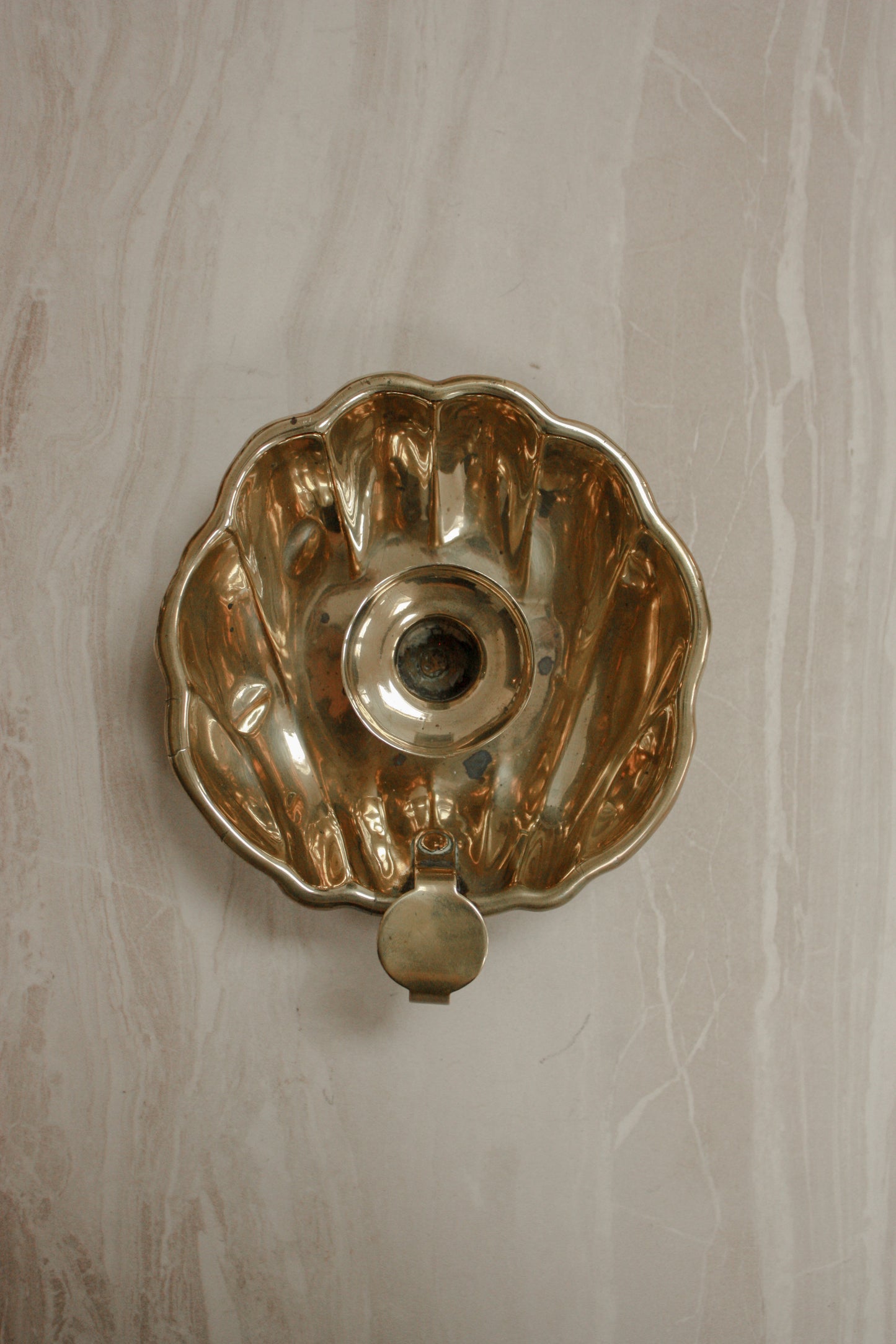 Vintage French brass-plated shell chamberstick