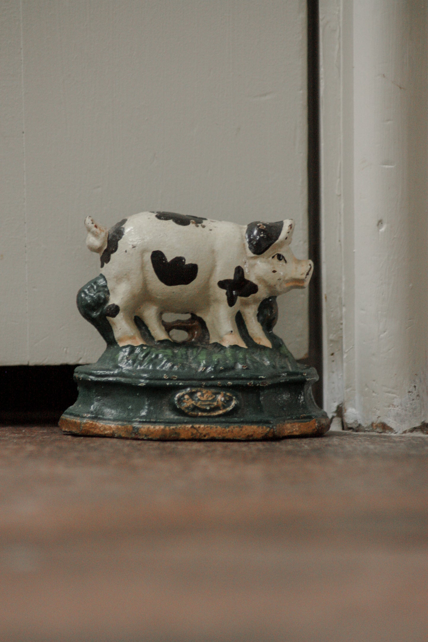 Vintage cast iron pig door stop
