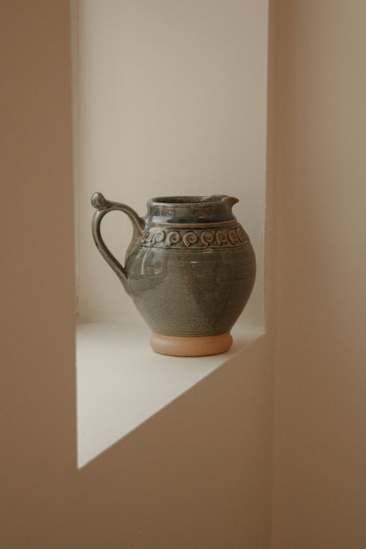 Studio pottery ammonite pitcher