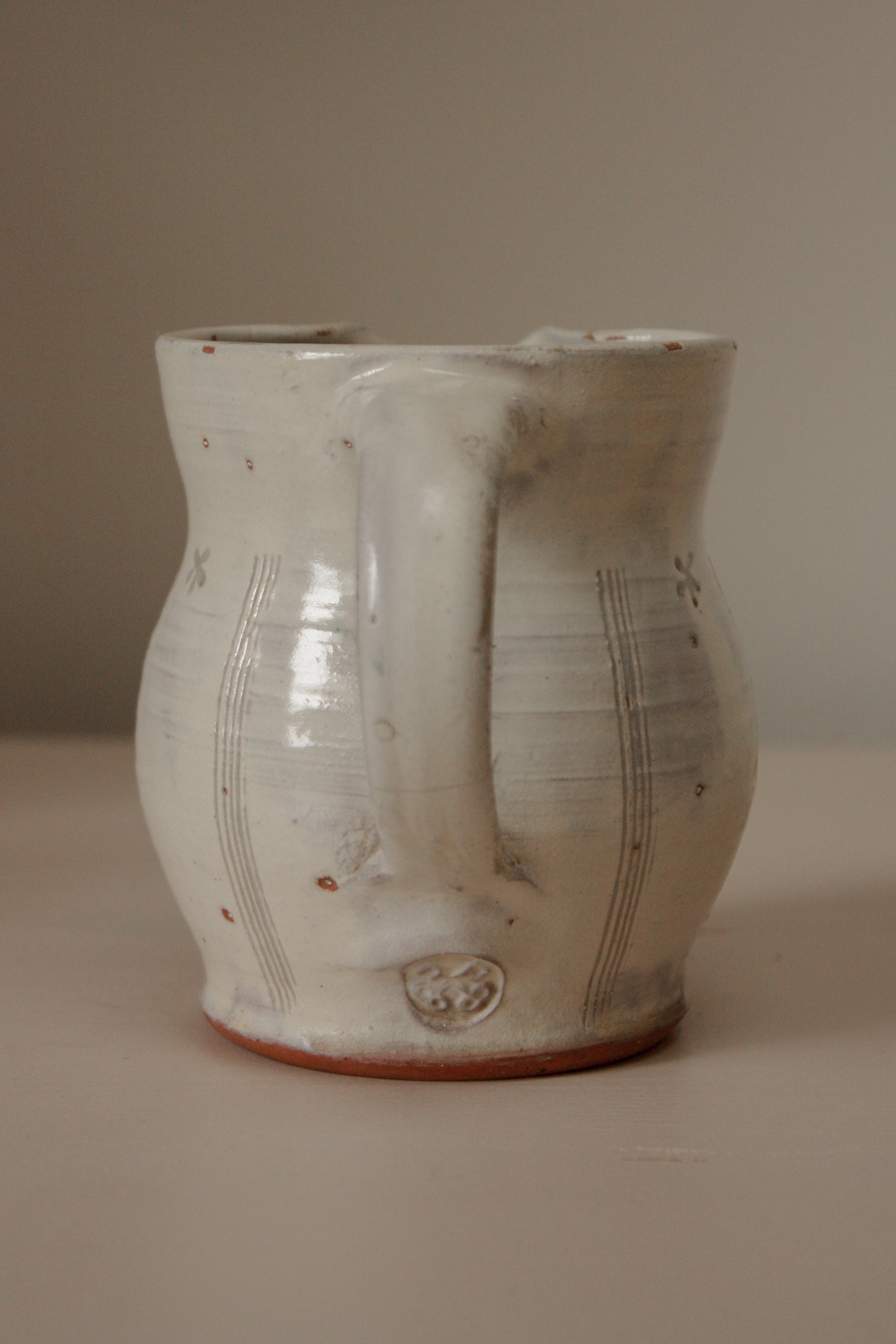 Vintage cream studio pottery jug