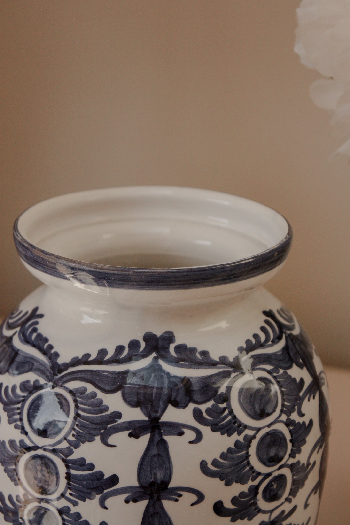 Vintage hand painted blue and white urn