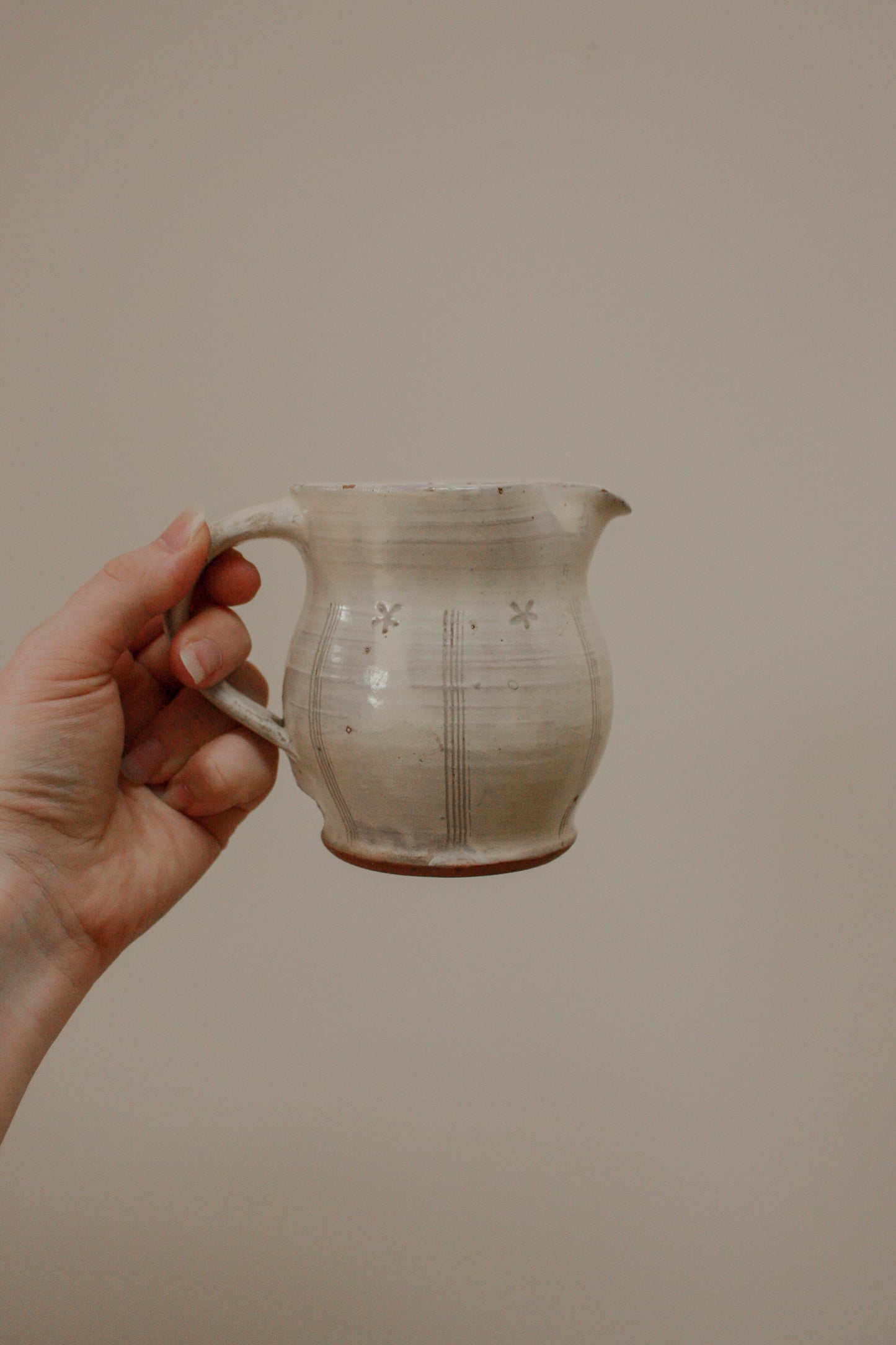Vintage cream studio pottery jug