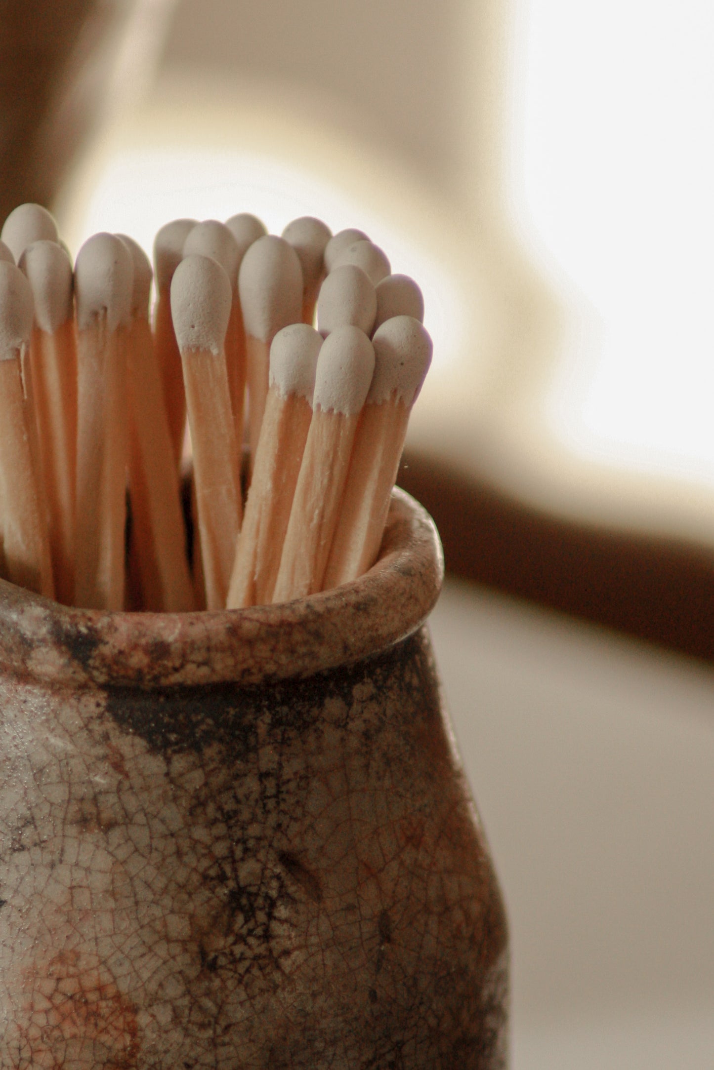 Vintage weathered and worn stoneware match pot