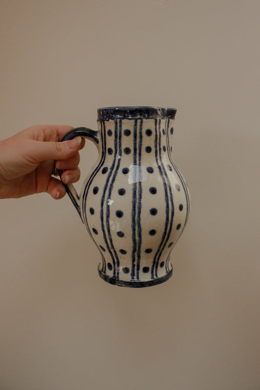 Vintage blue and white pottery pitcher