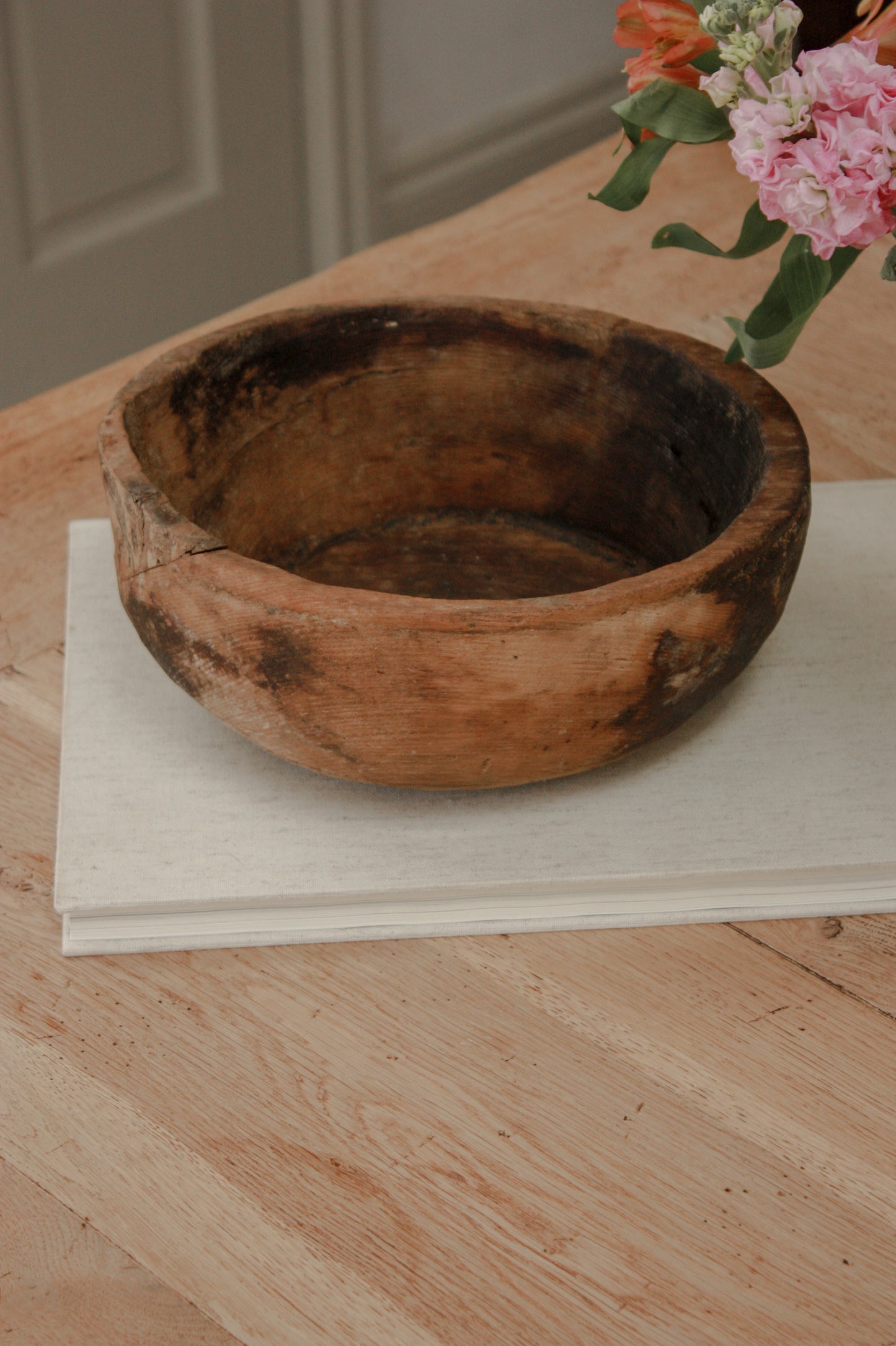 Vintage weathered and textured rustic wooden bowl