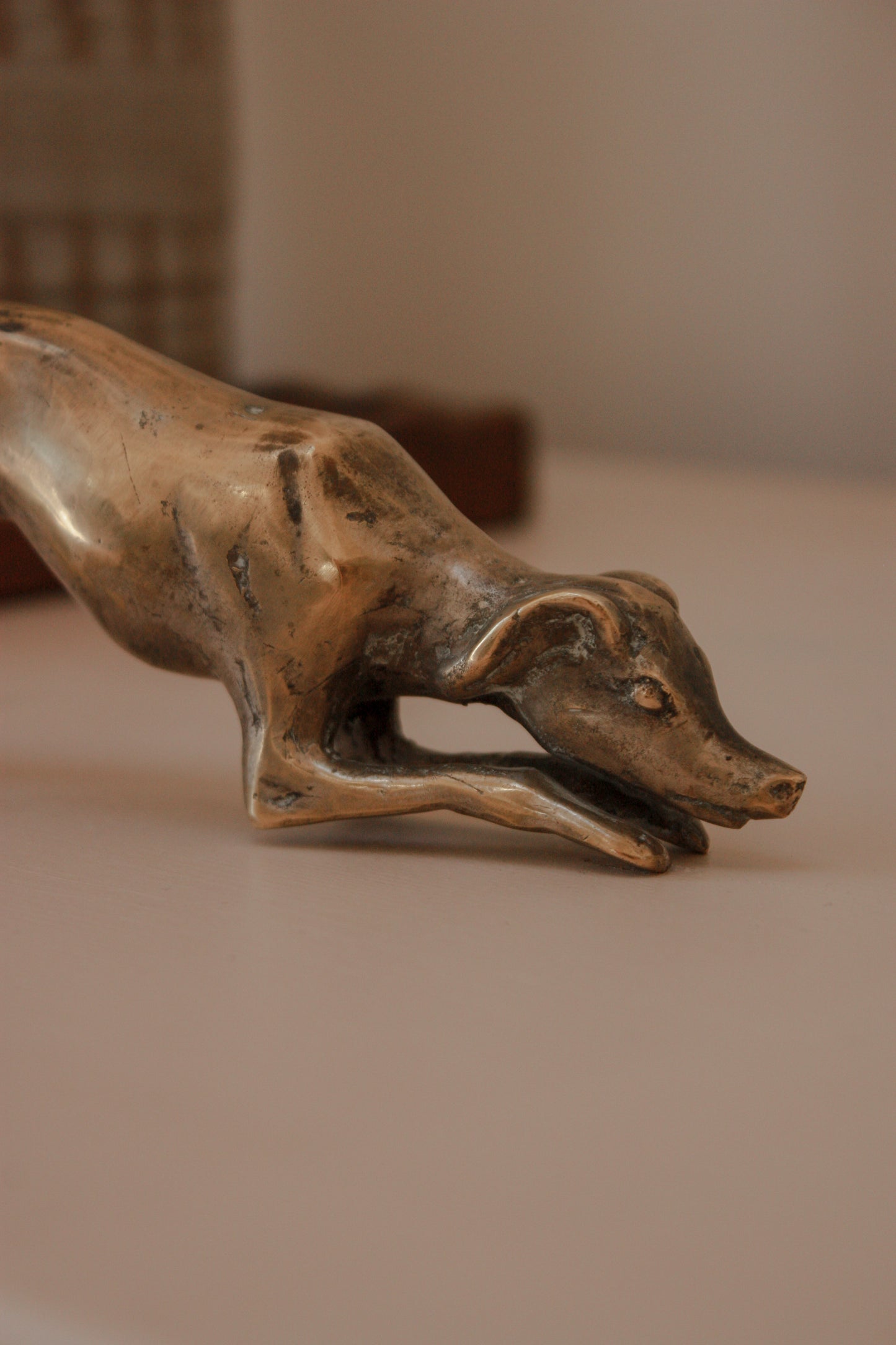 Vintage sculptural brass greyhound - playful