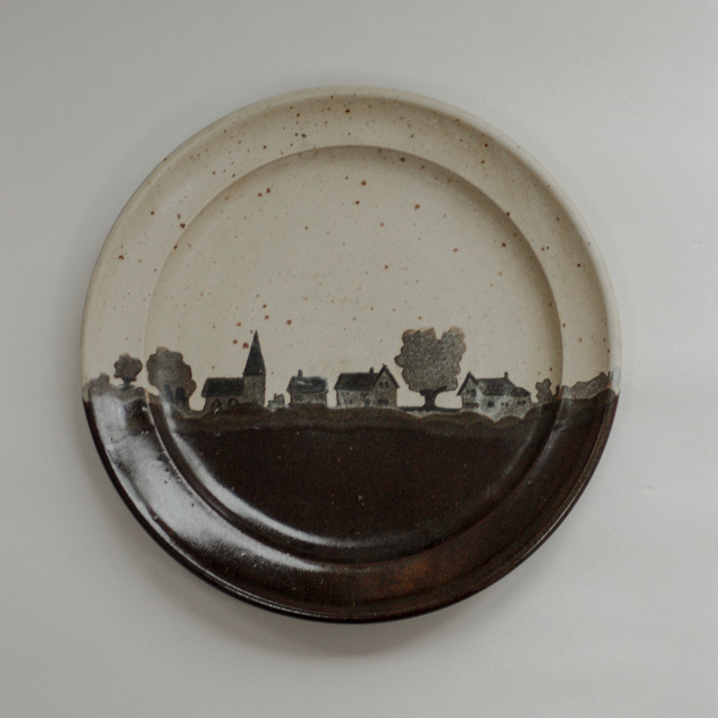 Vintage studio pottery plate - home on the horizon