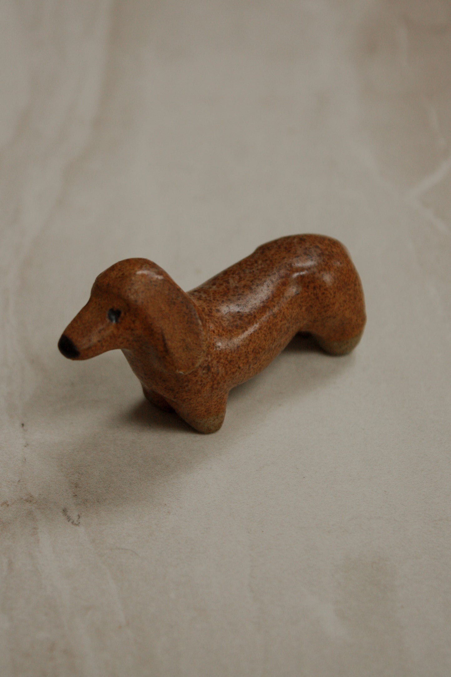 Vintage studio pottery sausage dog sculpture
