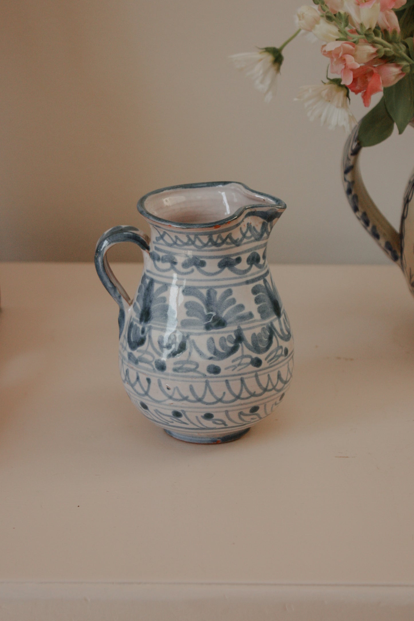 Vintage hand painted blue and white jug