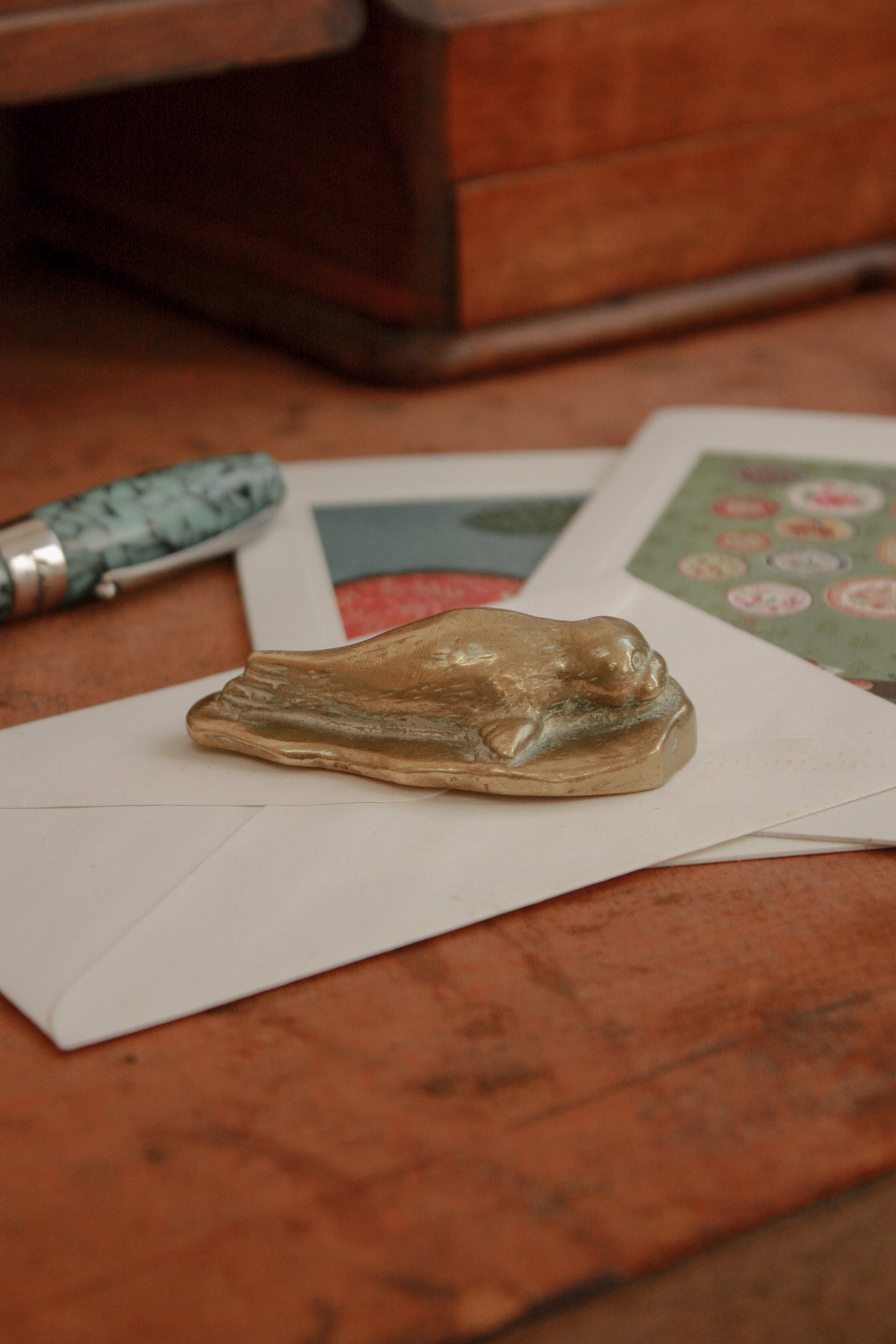 Vintage solid brass seal pup paperweight