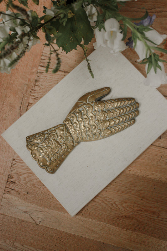 Vintage solid brass hand