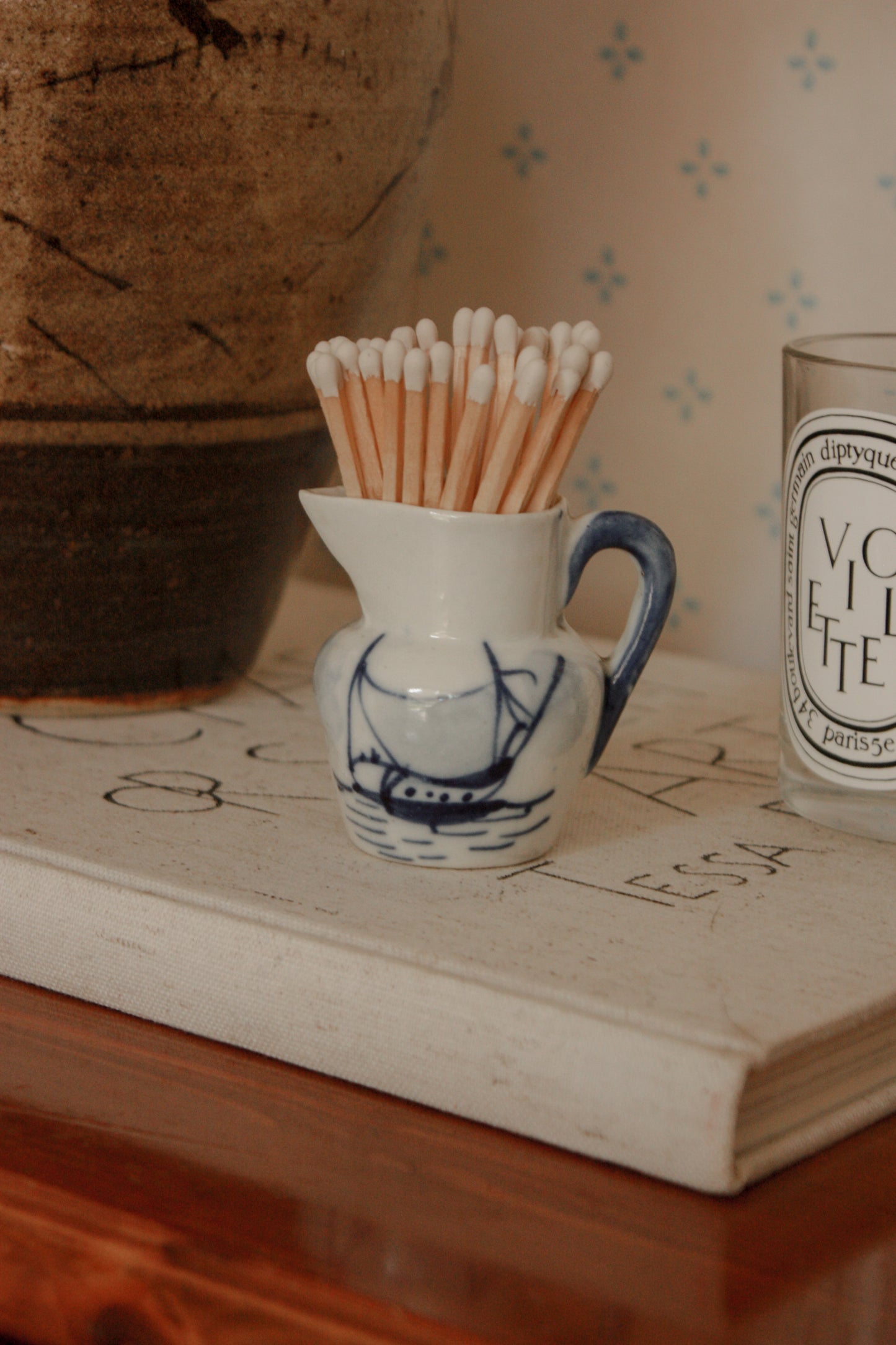 Vintage porcelain creamer with hand painted ship design