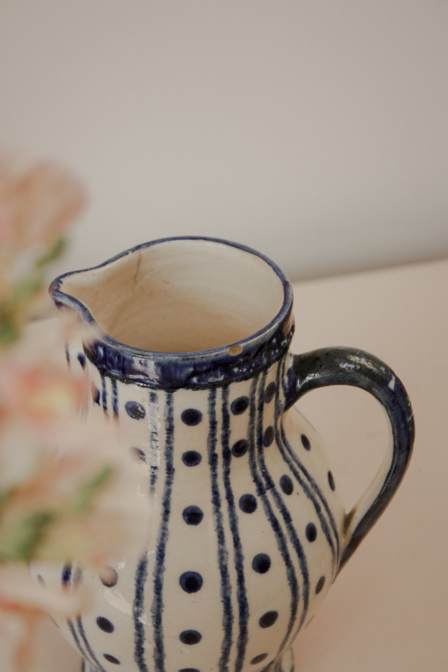 Vintage blue and white pottery pitcher
