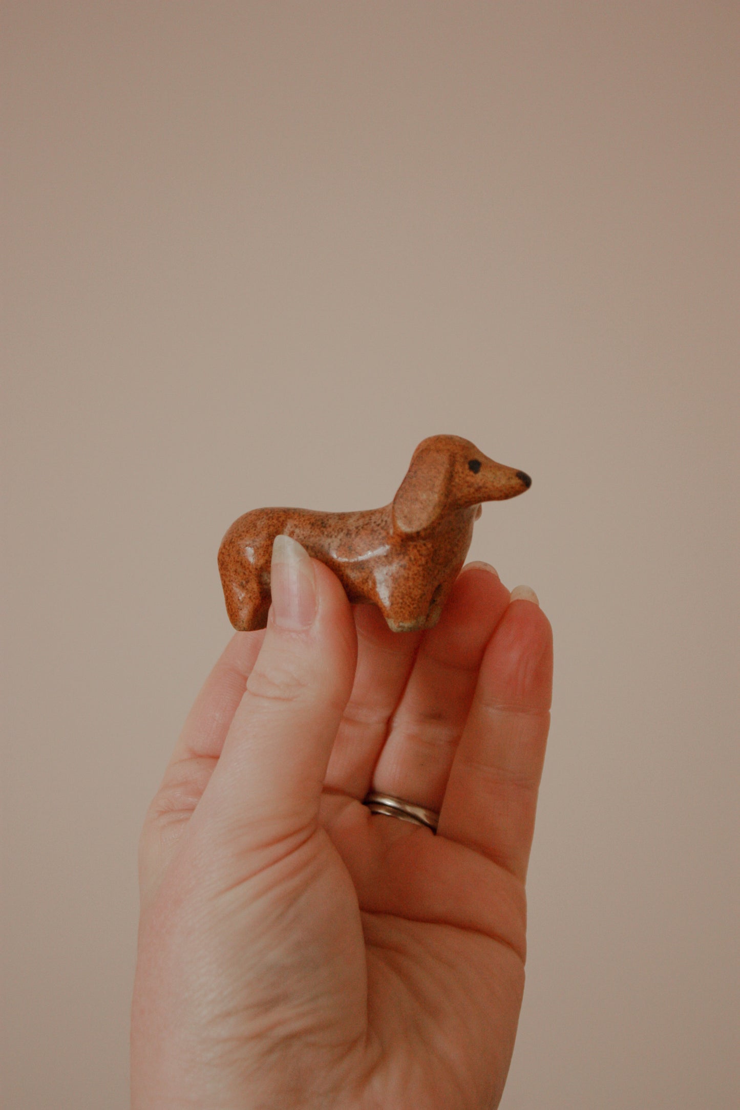 Vintage studio pottery sausage dog sculpture