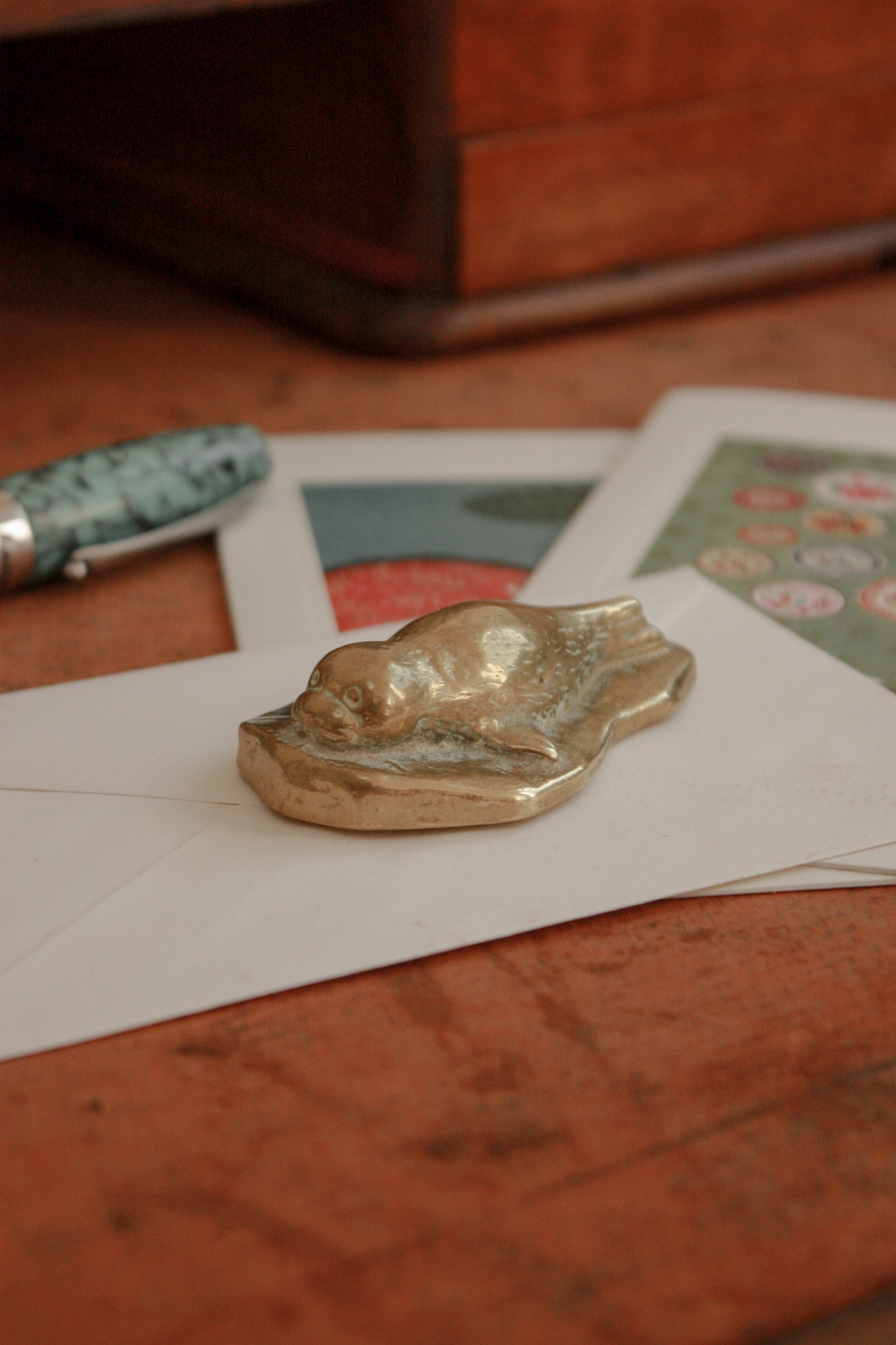 Vintage solid brass seal pup paperweight