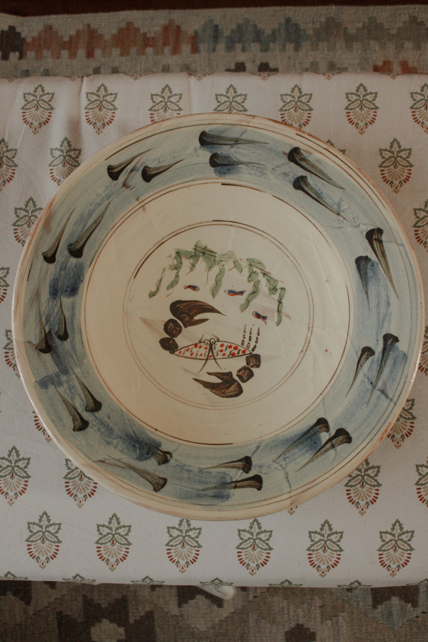 Large vintage slip glaze bowl - blue rim and crab design