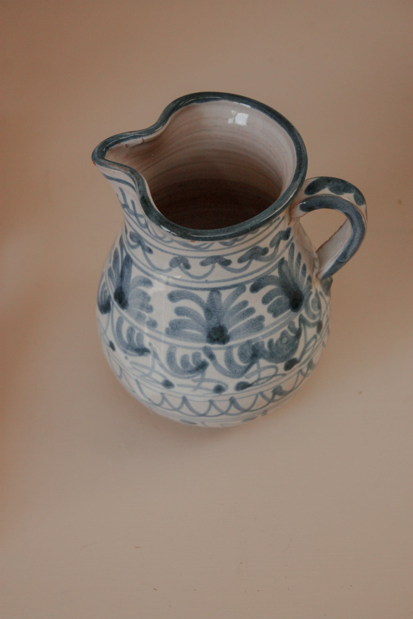 Vintage hand painted blue and white jug