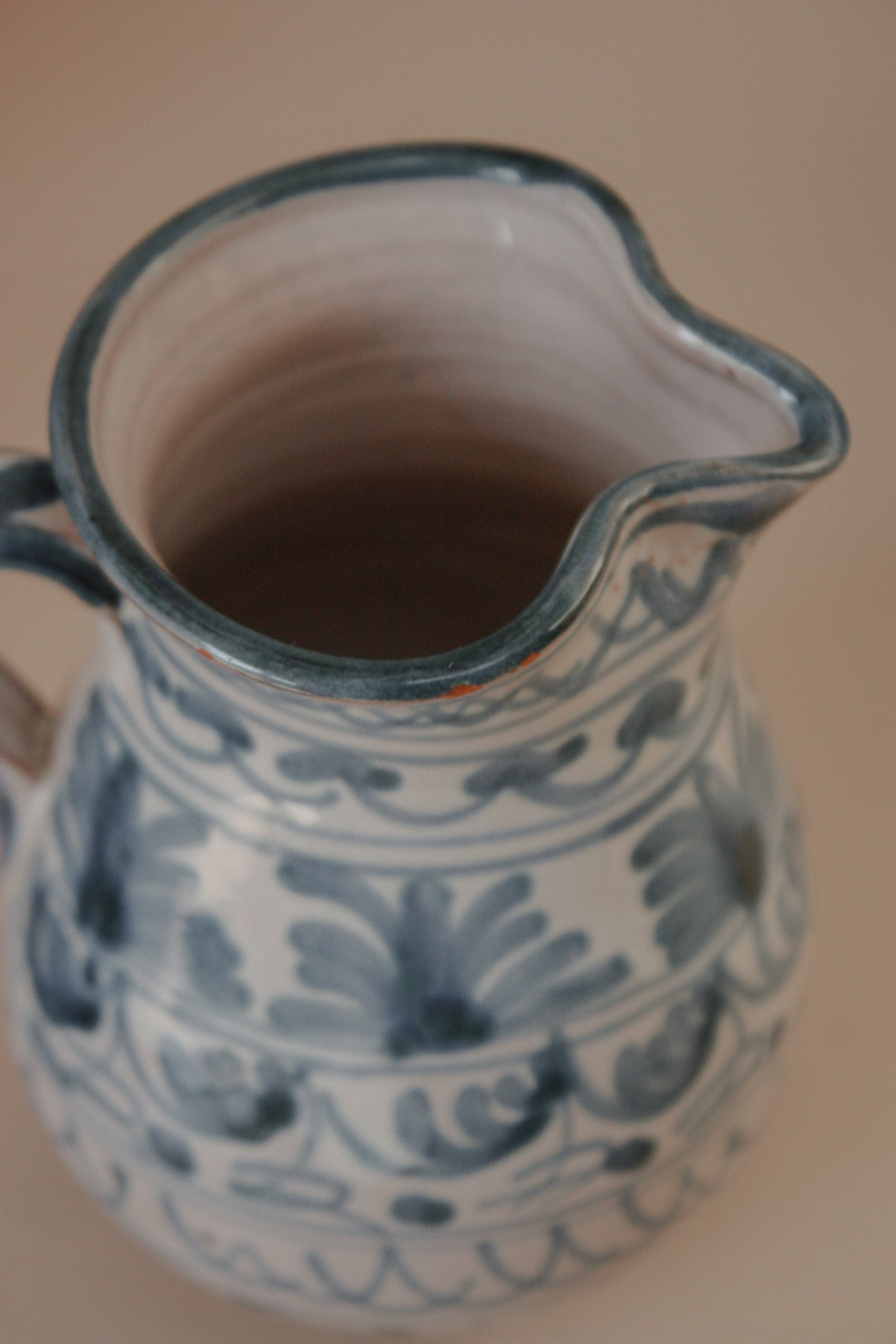Vintage hand painted blue and white jug