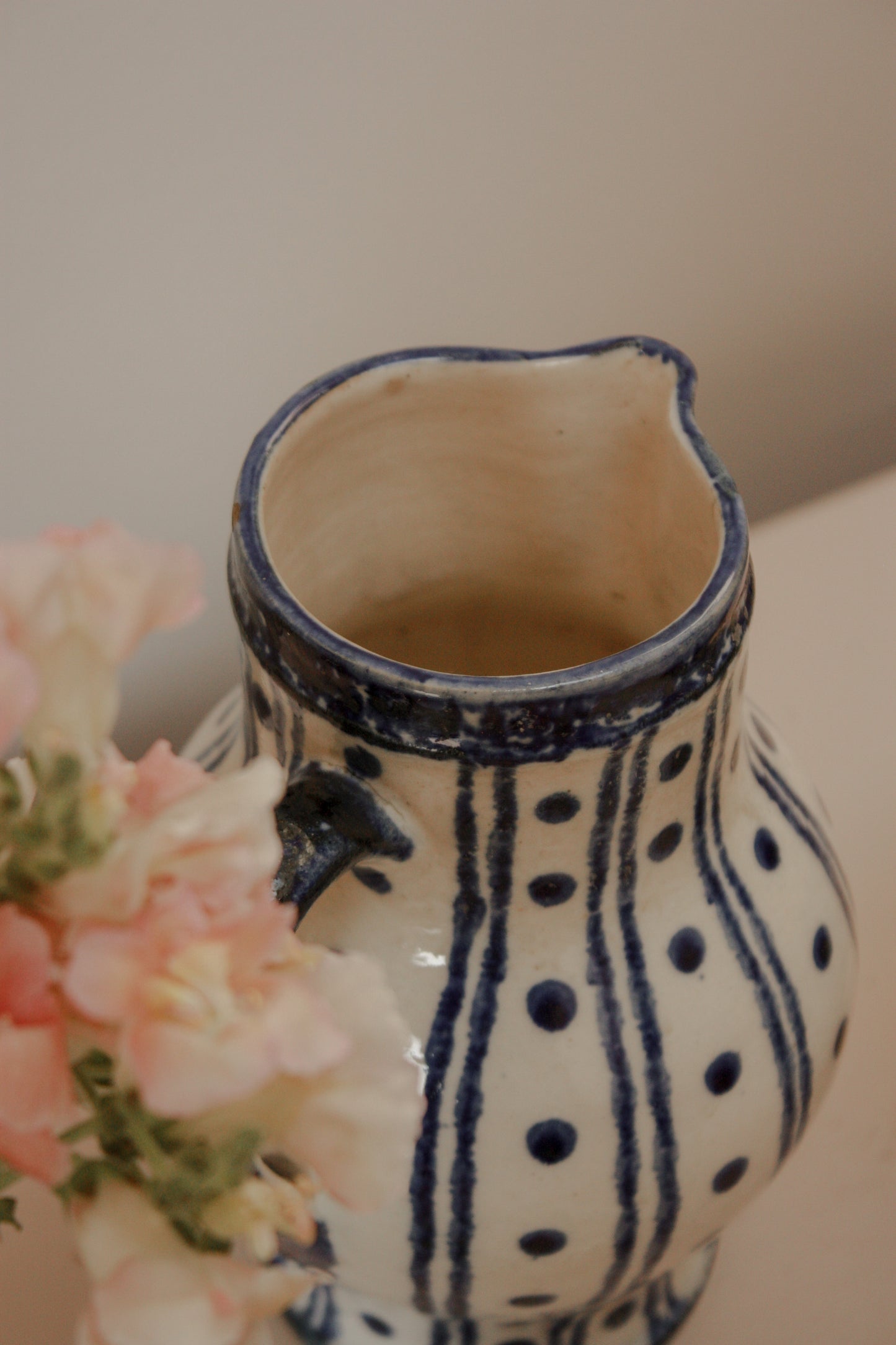 Vintage blue and white pottery pitcher