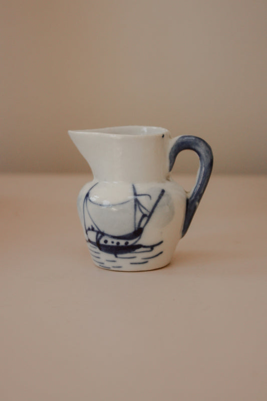 Vintage porcelain creamer with hand painted ship design