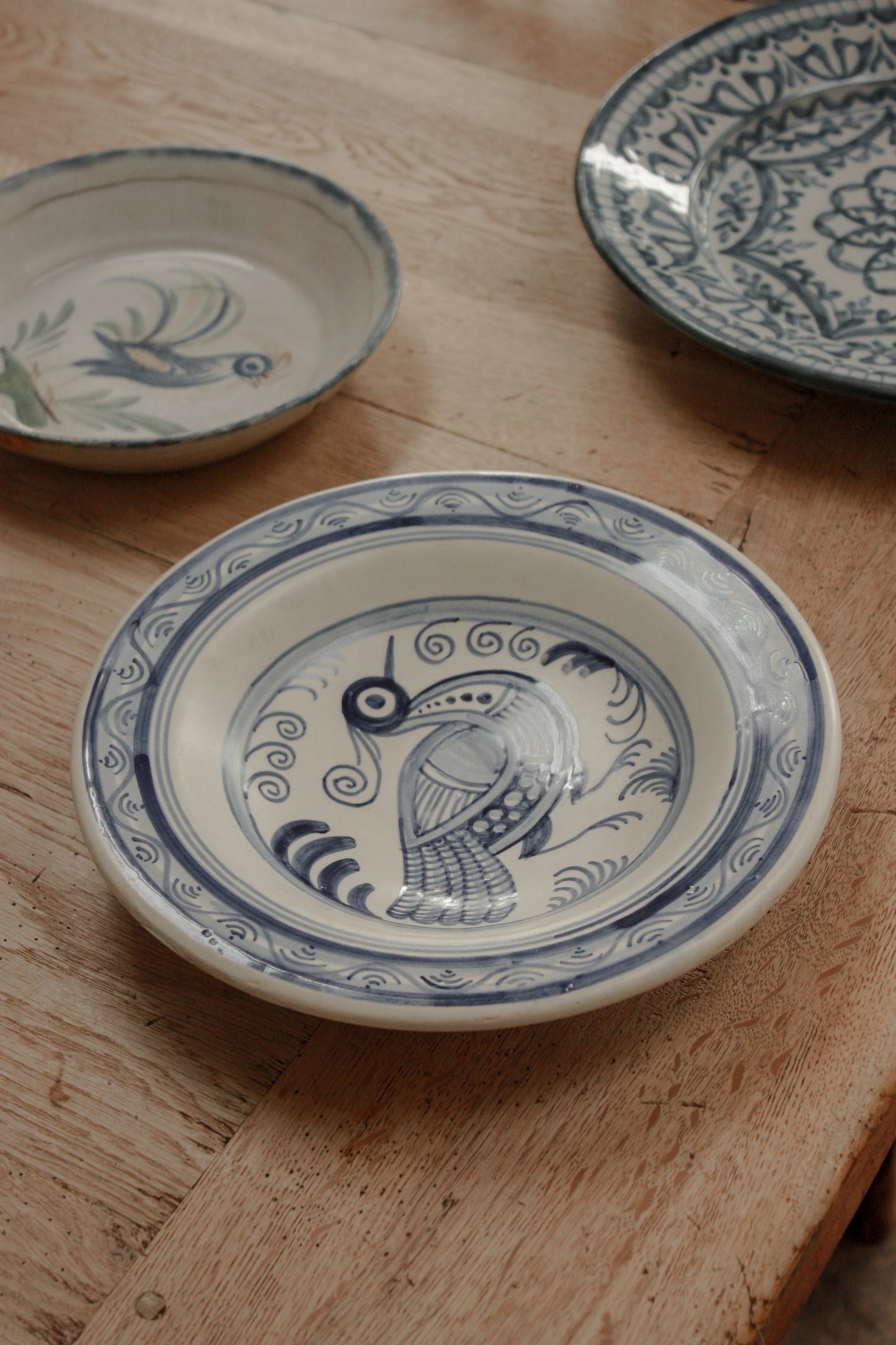 Vintage hand painted blue and white wall plate