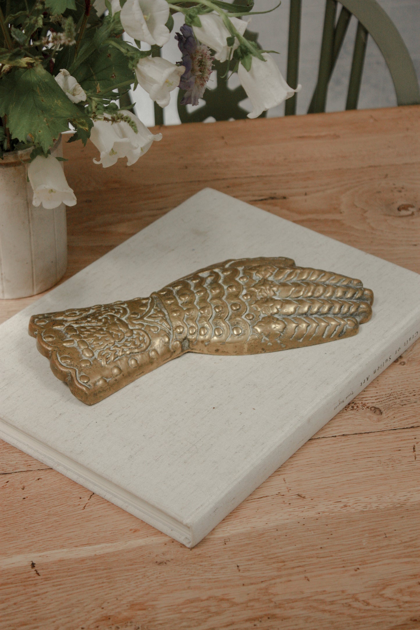 Vintage solid brass hand