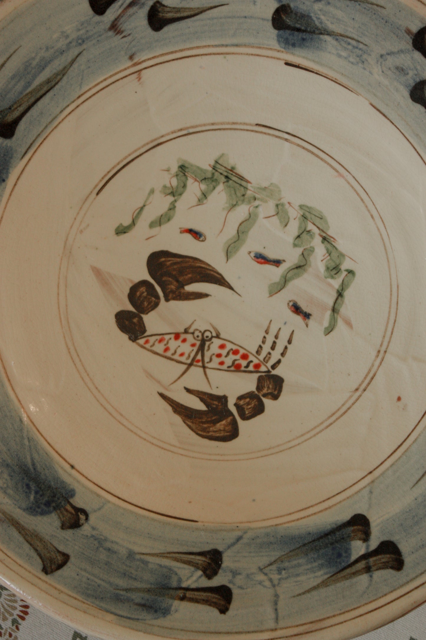 Large vintage slip glaze bowl - blue rim and crab design
