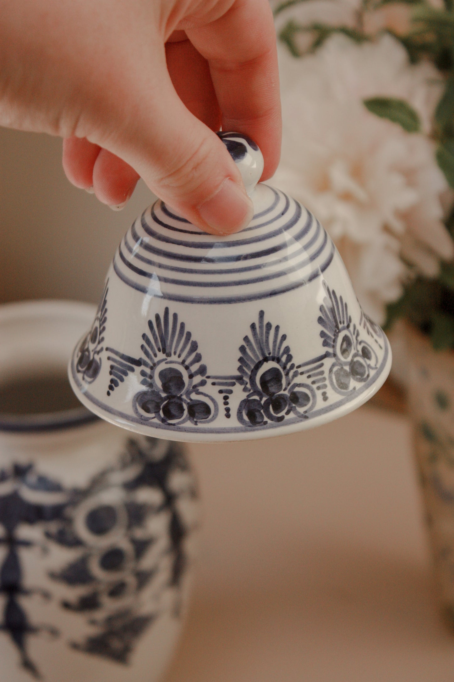 Vintage hand painted blue and white urn