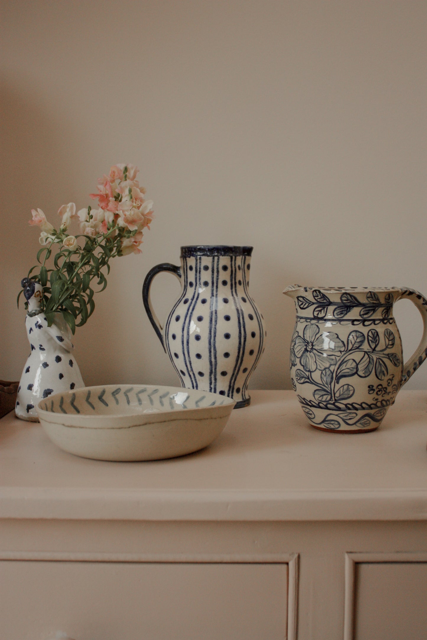 Vintage blue and white pottery pitcher