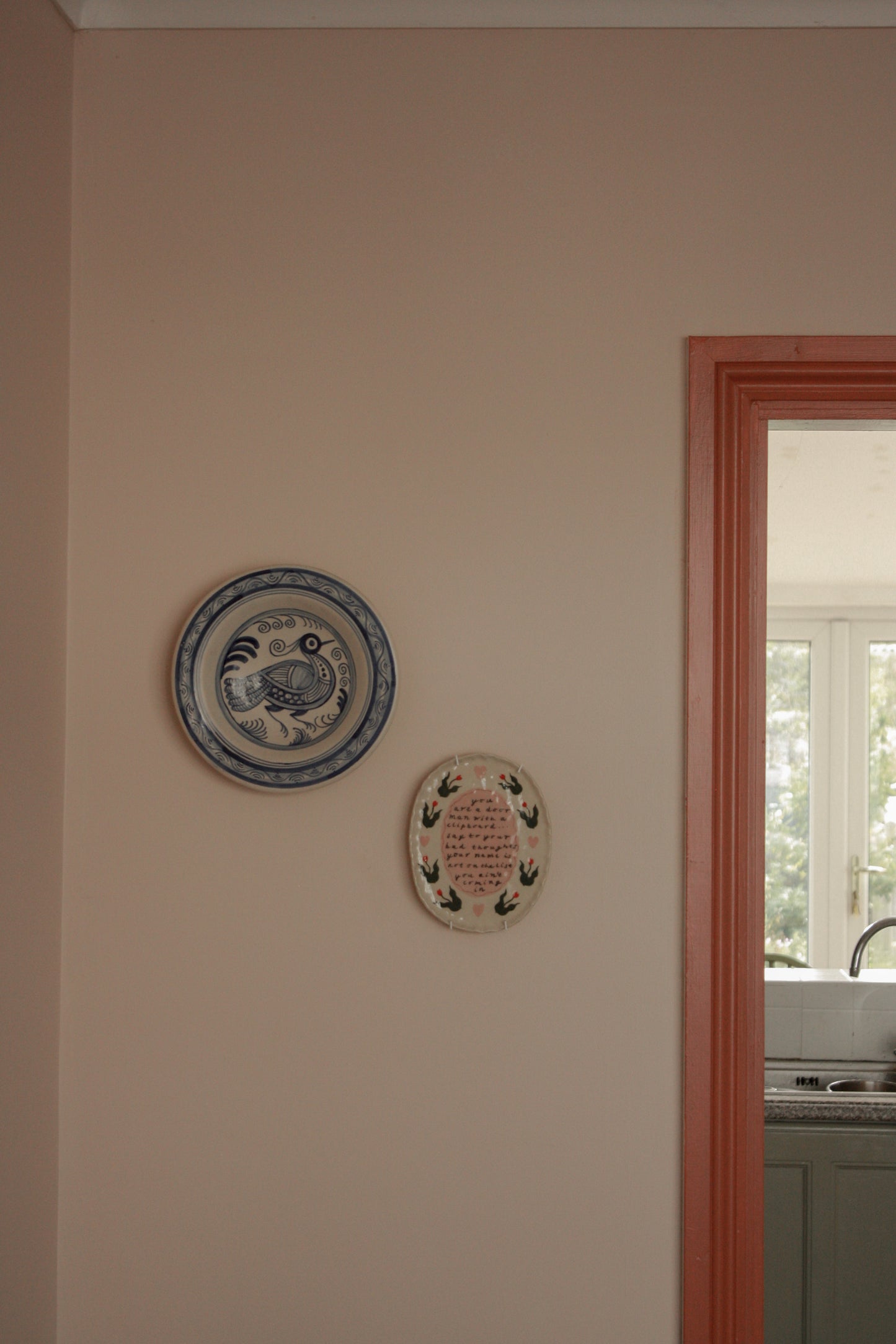 Vintage hand painted blue and white wall plate
