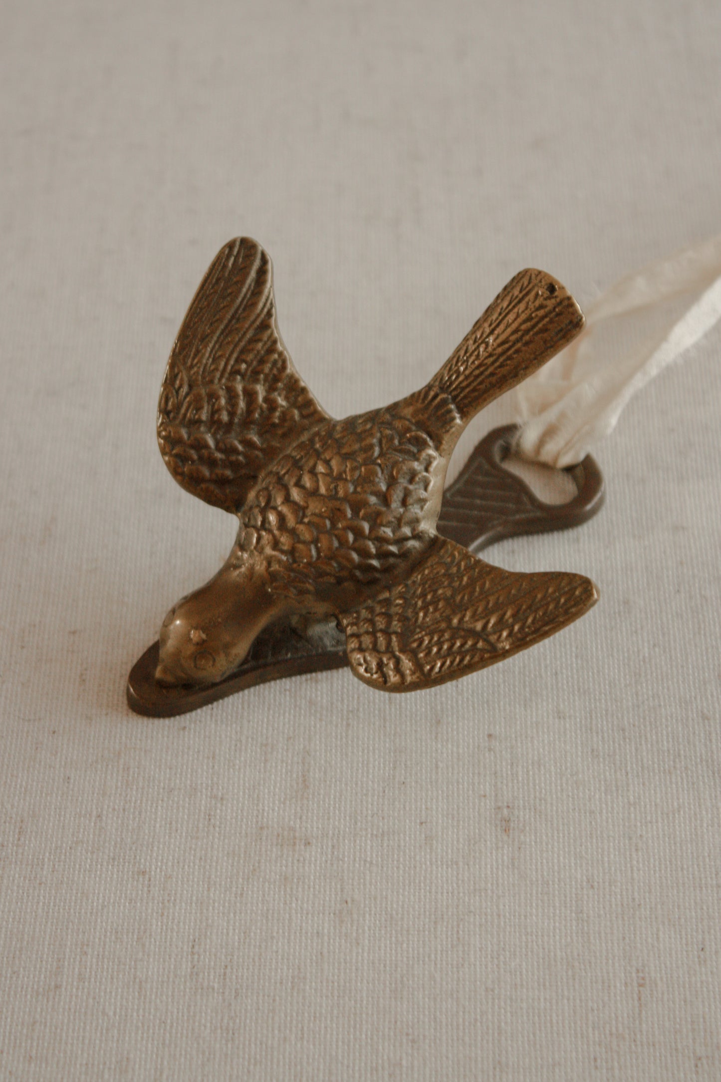 Vintage brass pigeon letter clip