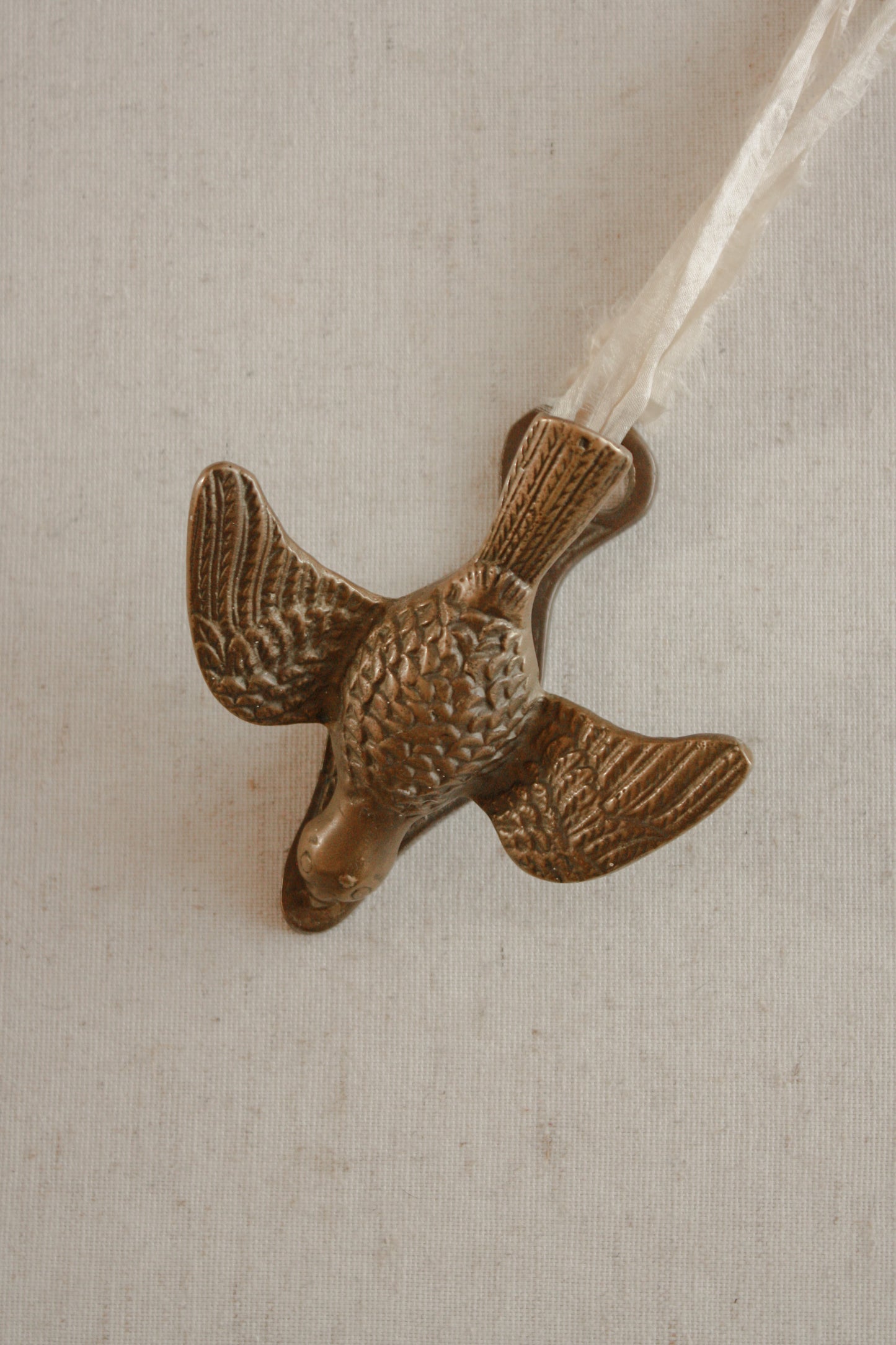 Vintage brass pigeon letter clip
