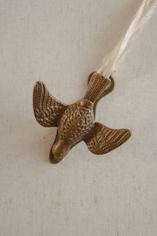 Vintage brass pigeon letter clip