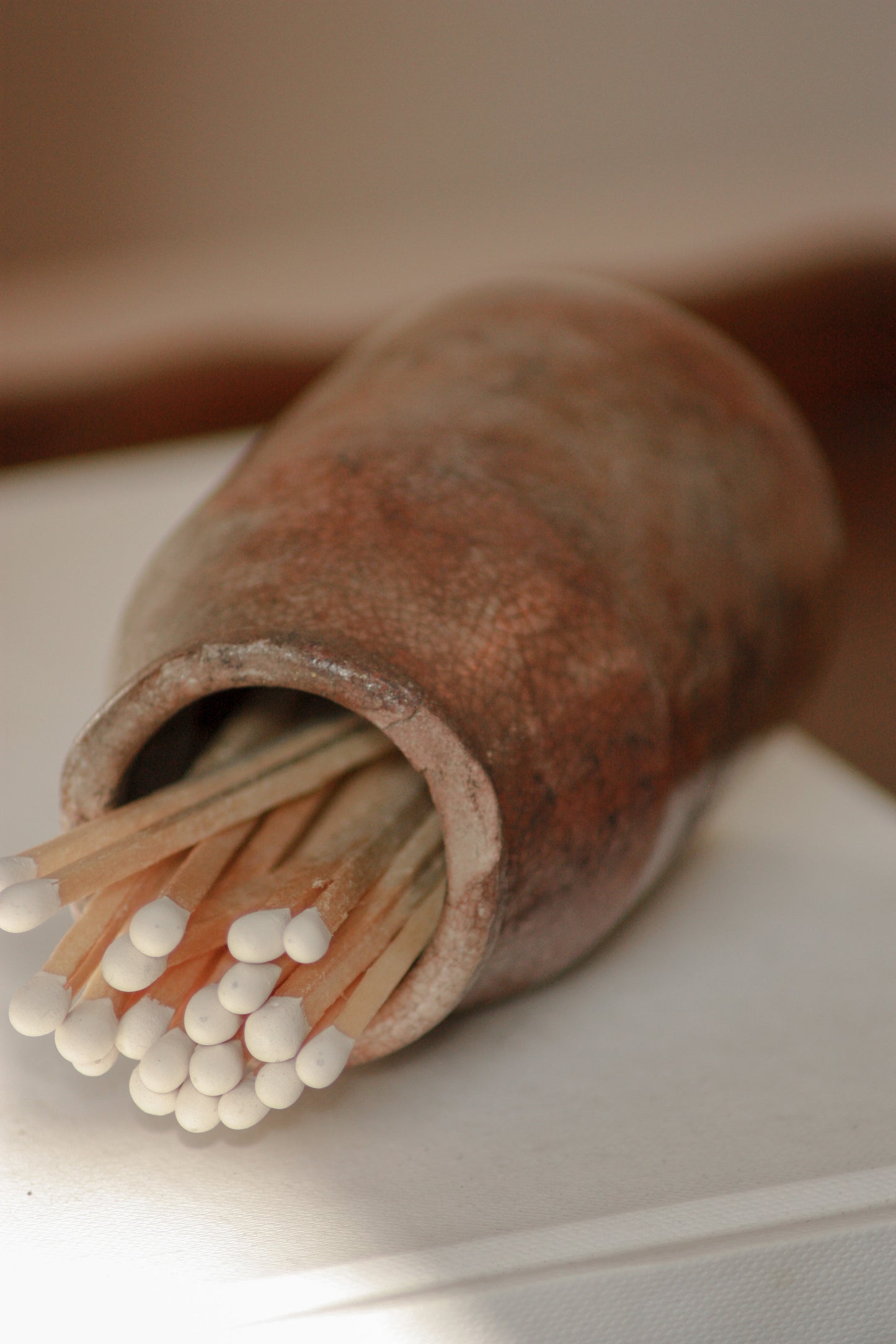 Vintage weathered and worn stoneware match pot