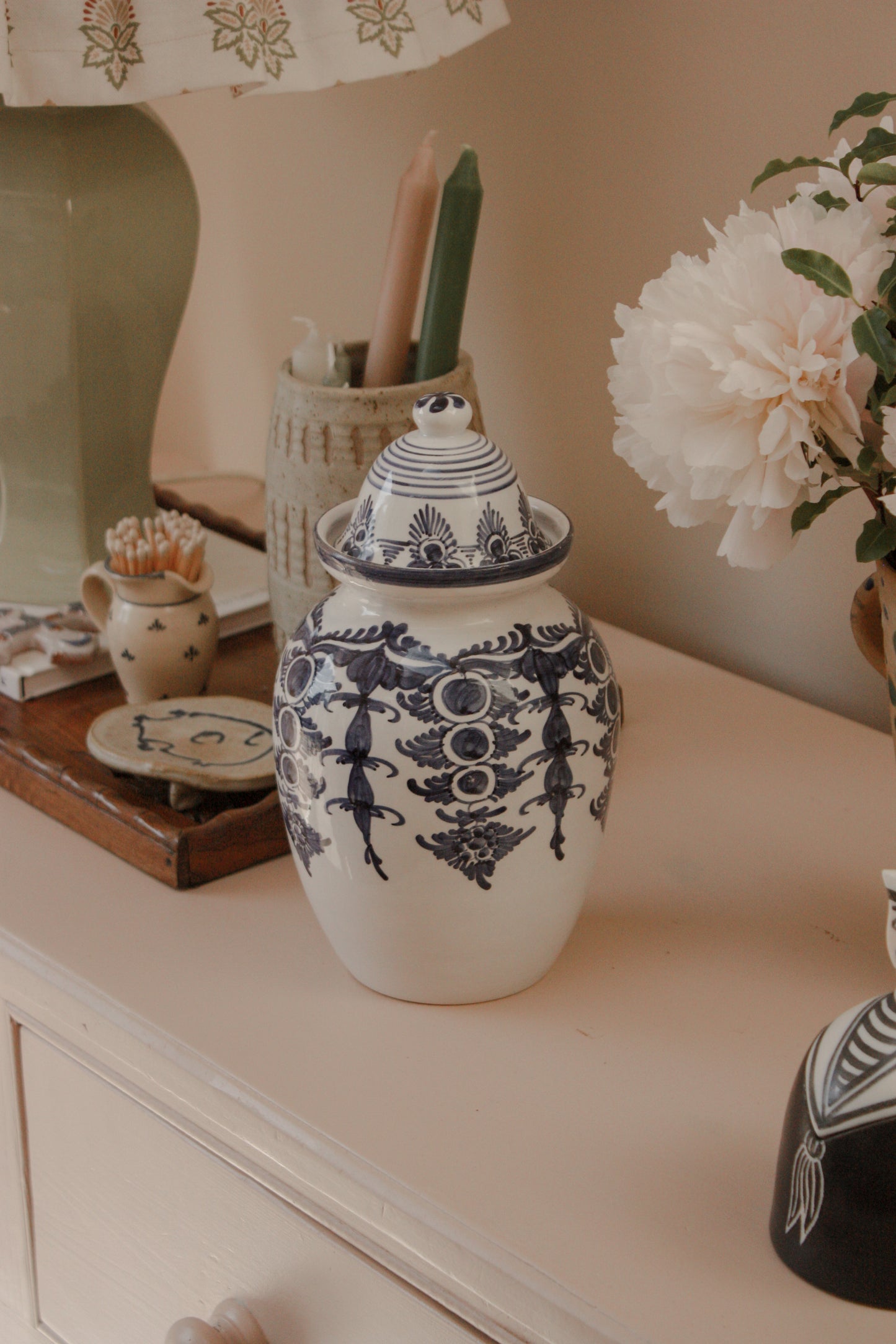 Vintage hand painted blue and white urn