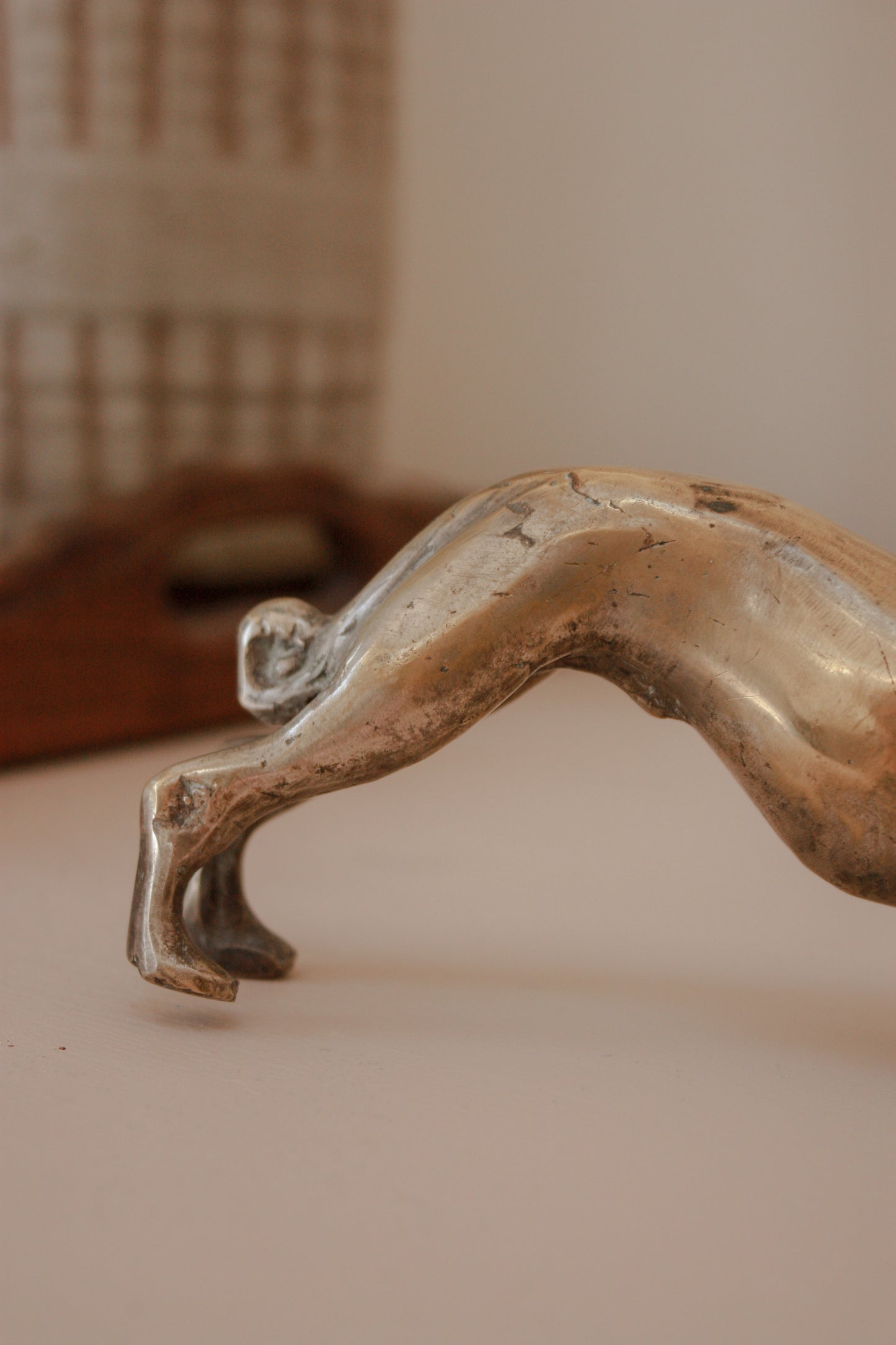 Vintage sculptural brass greyhound - playful