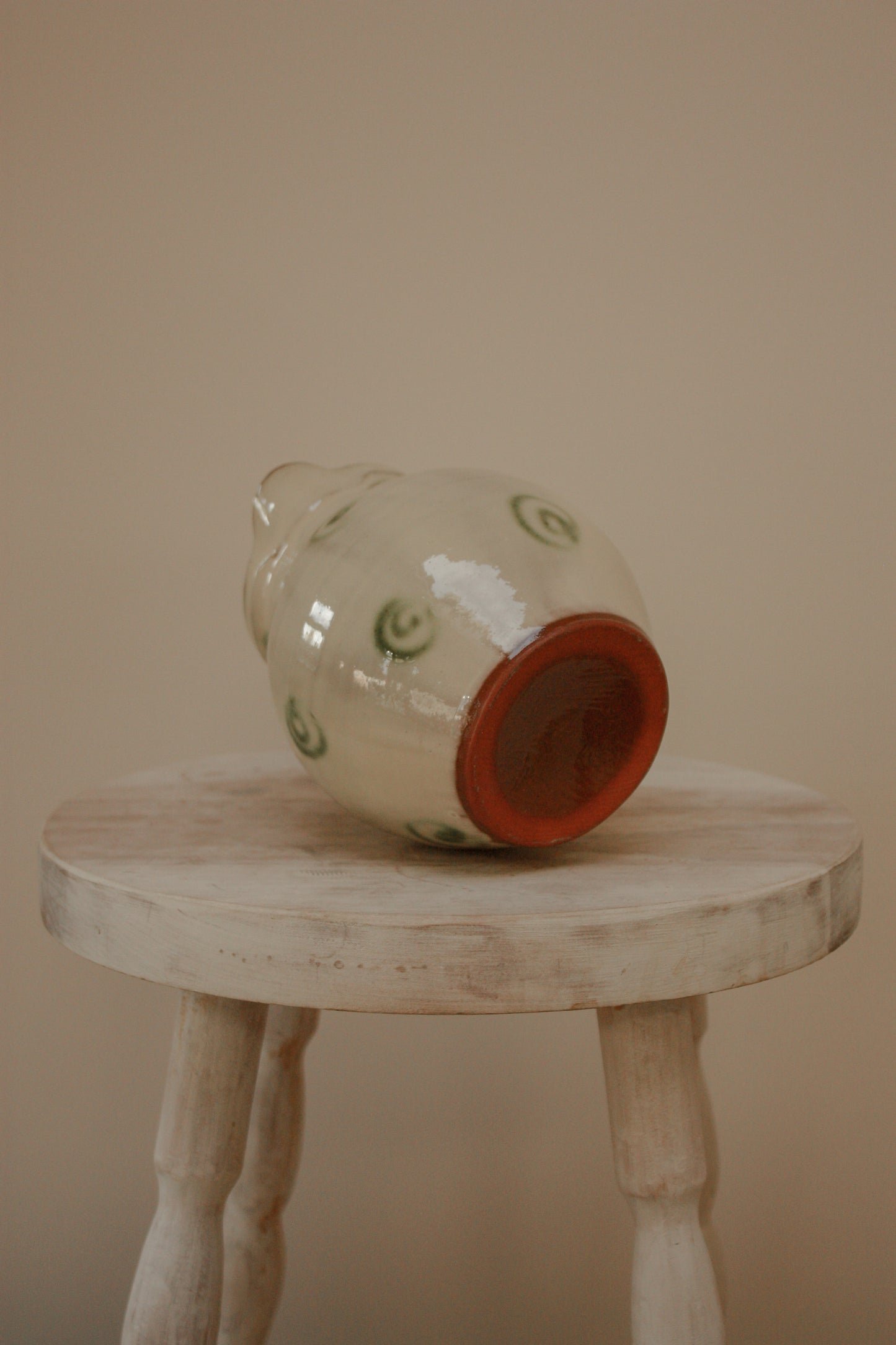 Vintage art pottery jug with swirl design