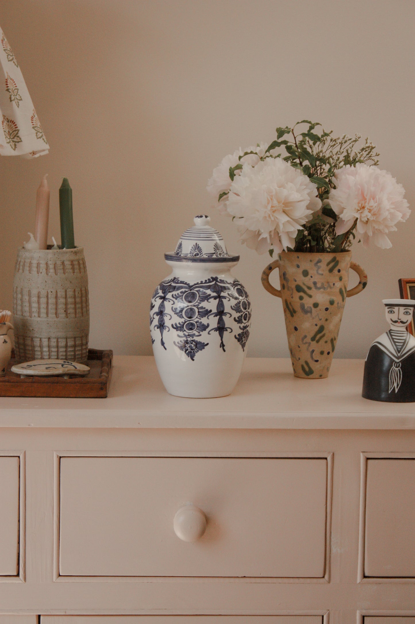 Vintage hand painted blue and white urn