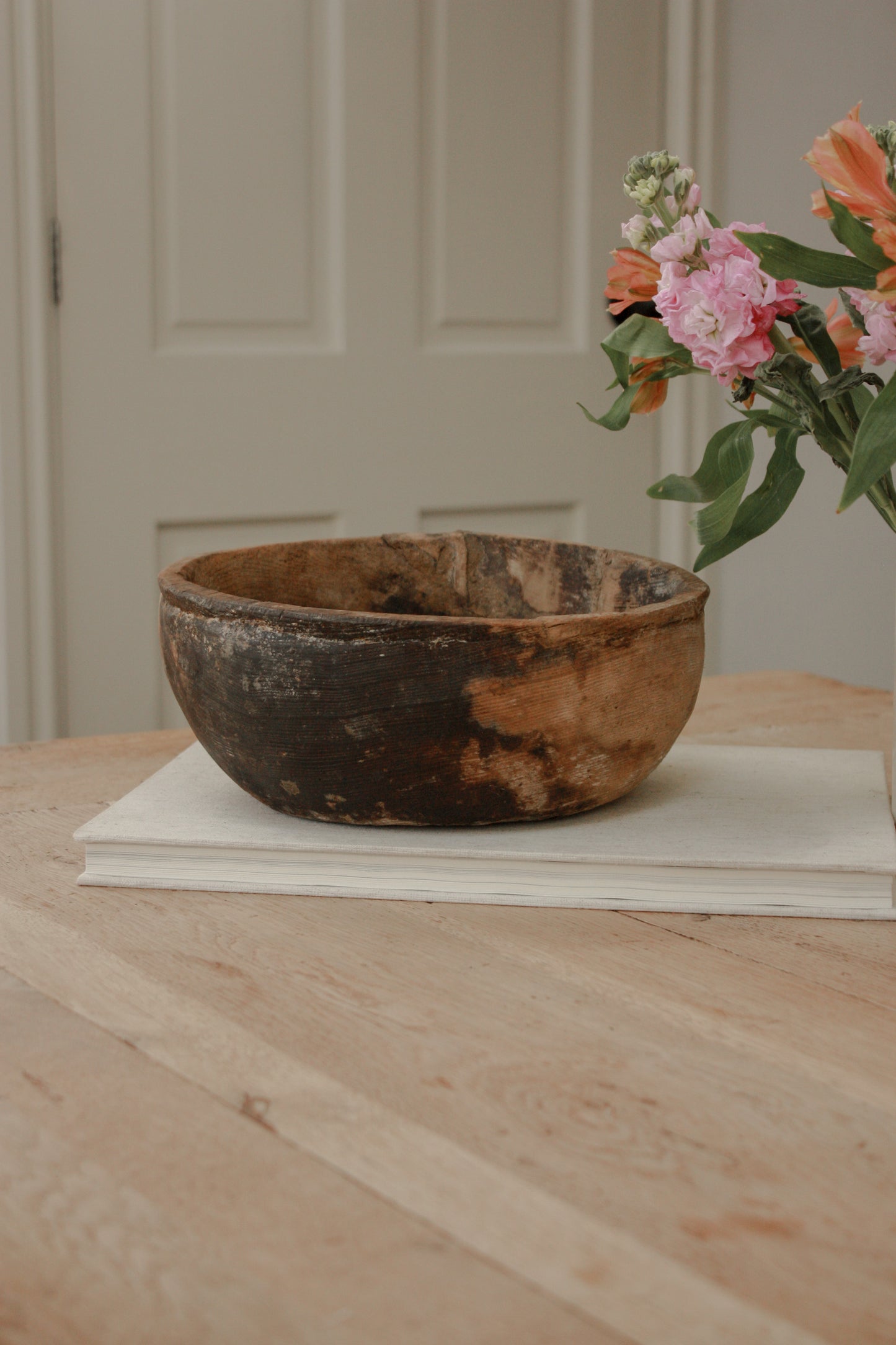 Vintage weathered and textured rustic wooden bowl