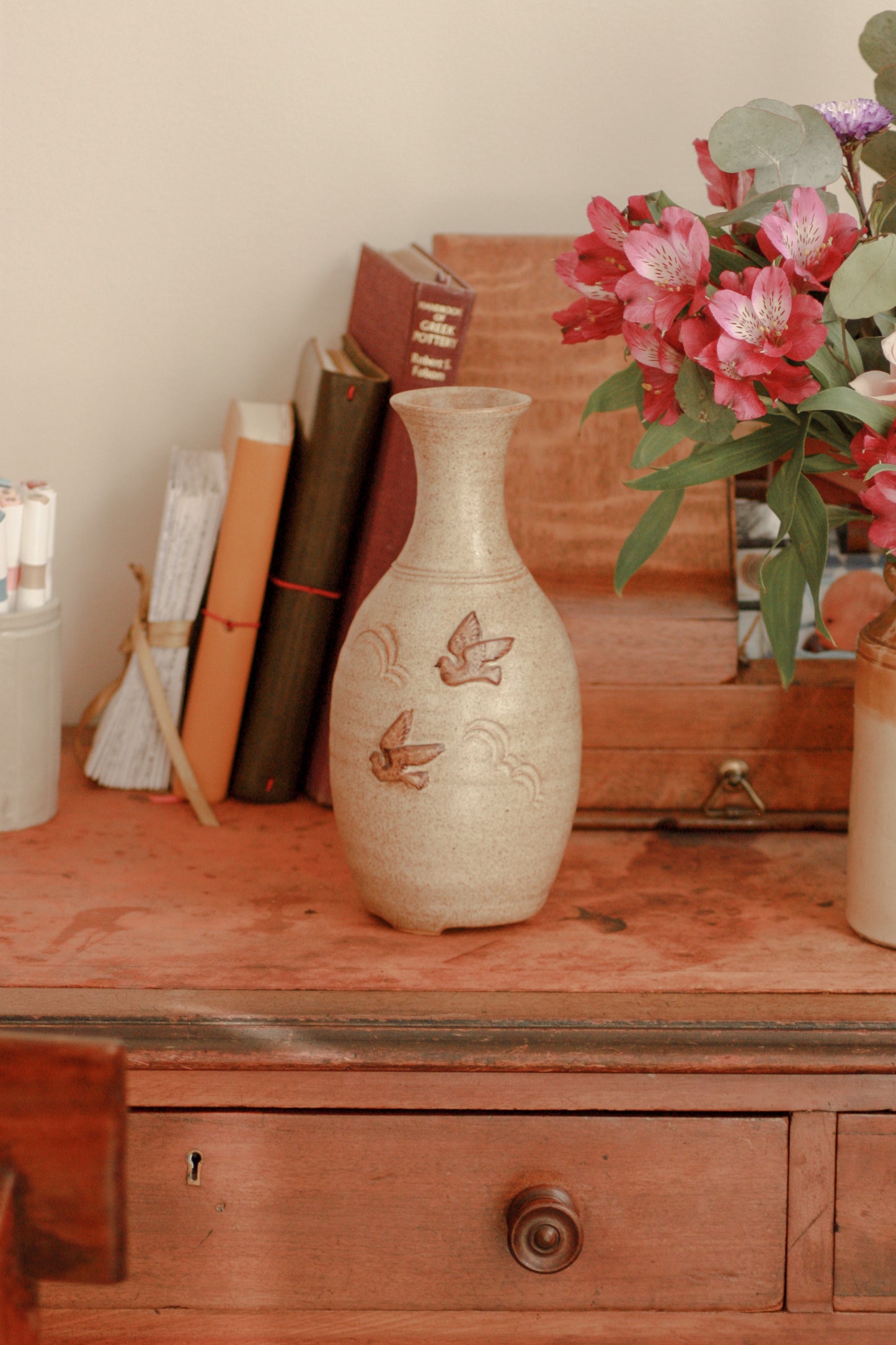 Vintage studio pottery vase with dove design