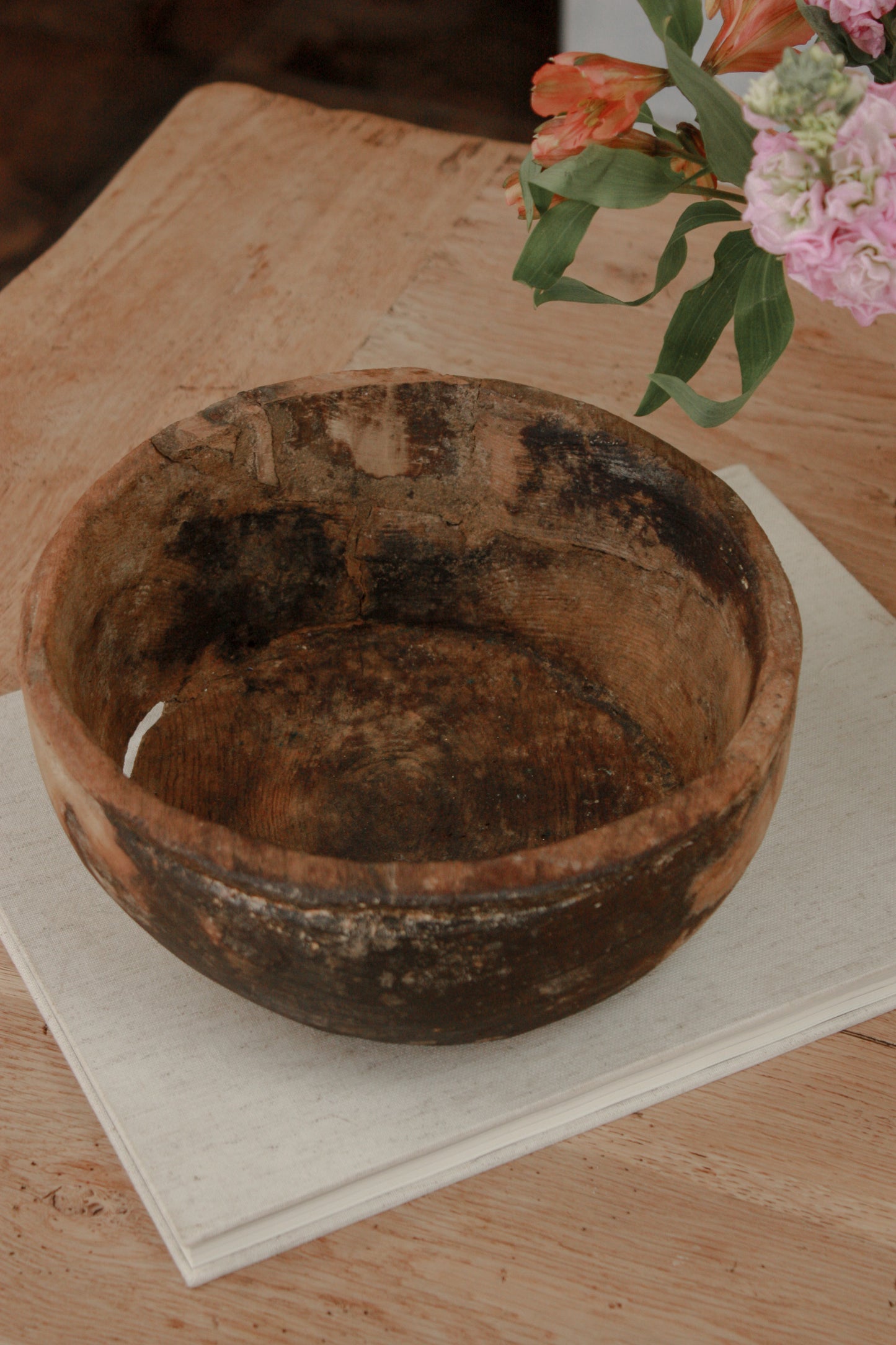 Vintage weathered and textured rustic wooden bowl