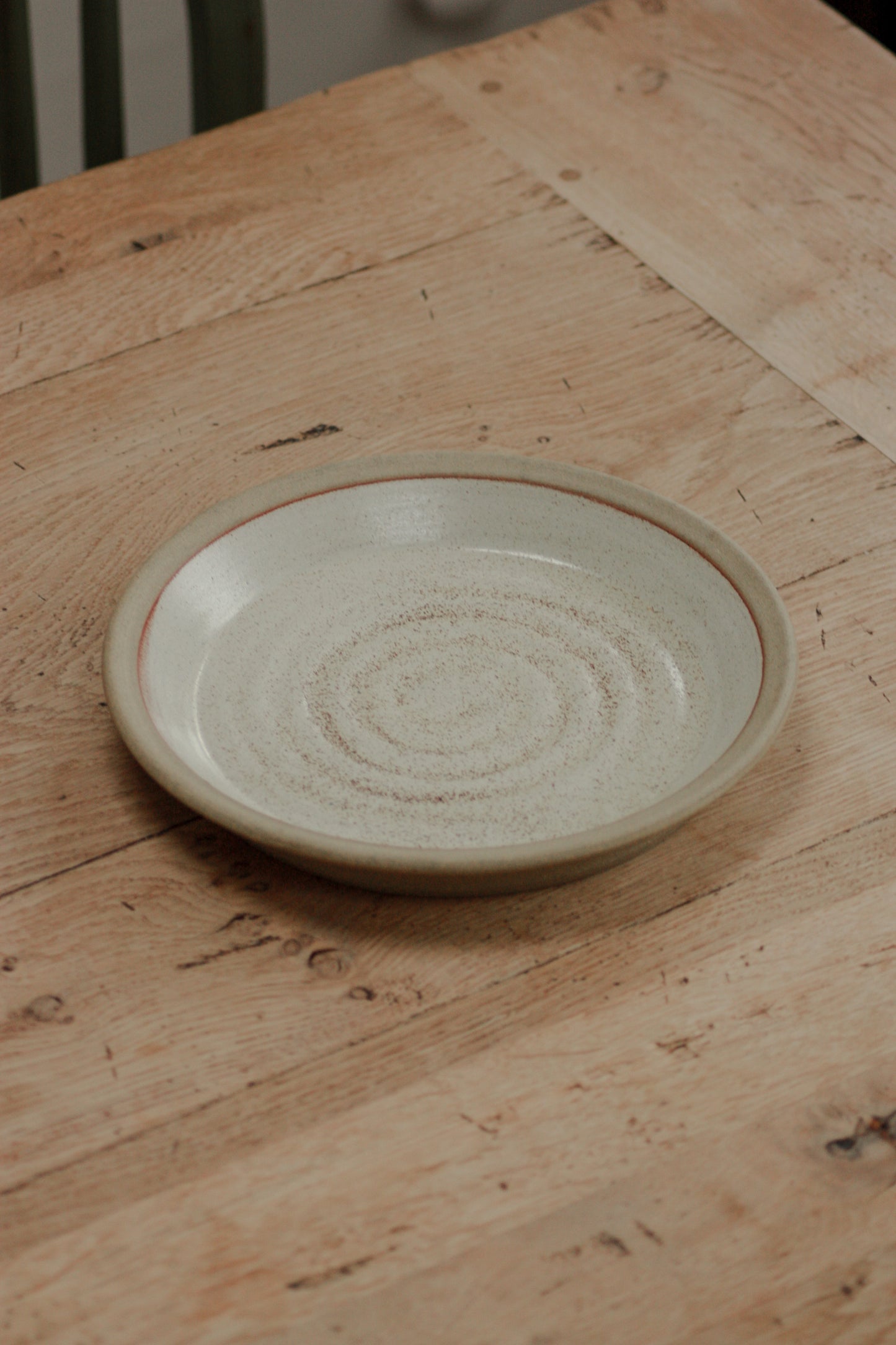 Studio pottery hand thrown dish with neutral glaze
