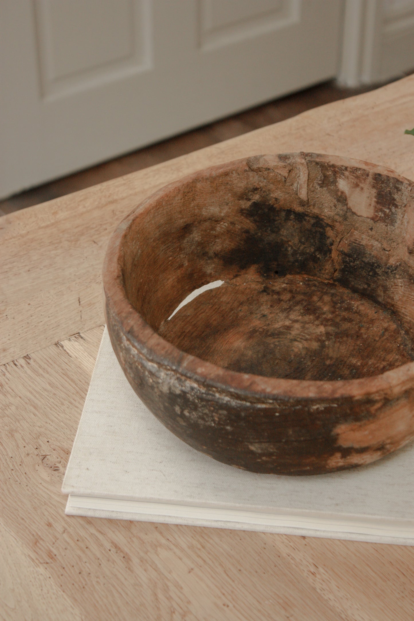 Vintage weathered and textured rustic wooden bowl