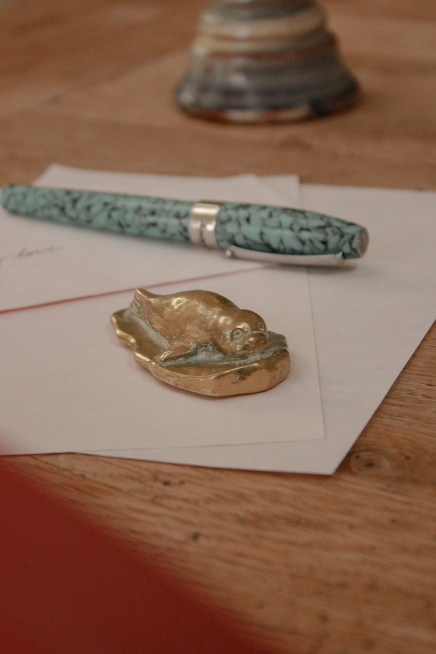 Vintage solid brass seal pup paperweight