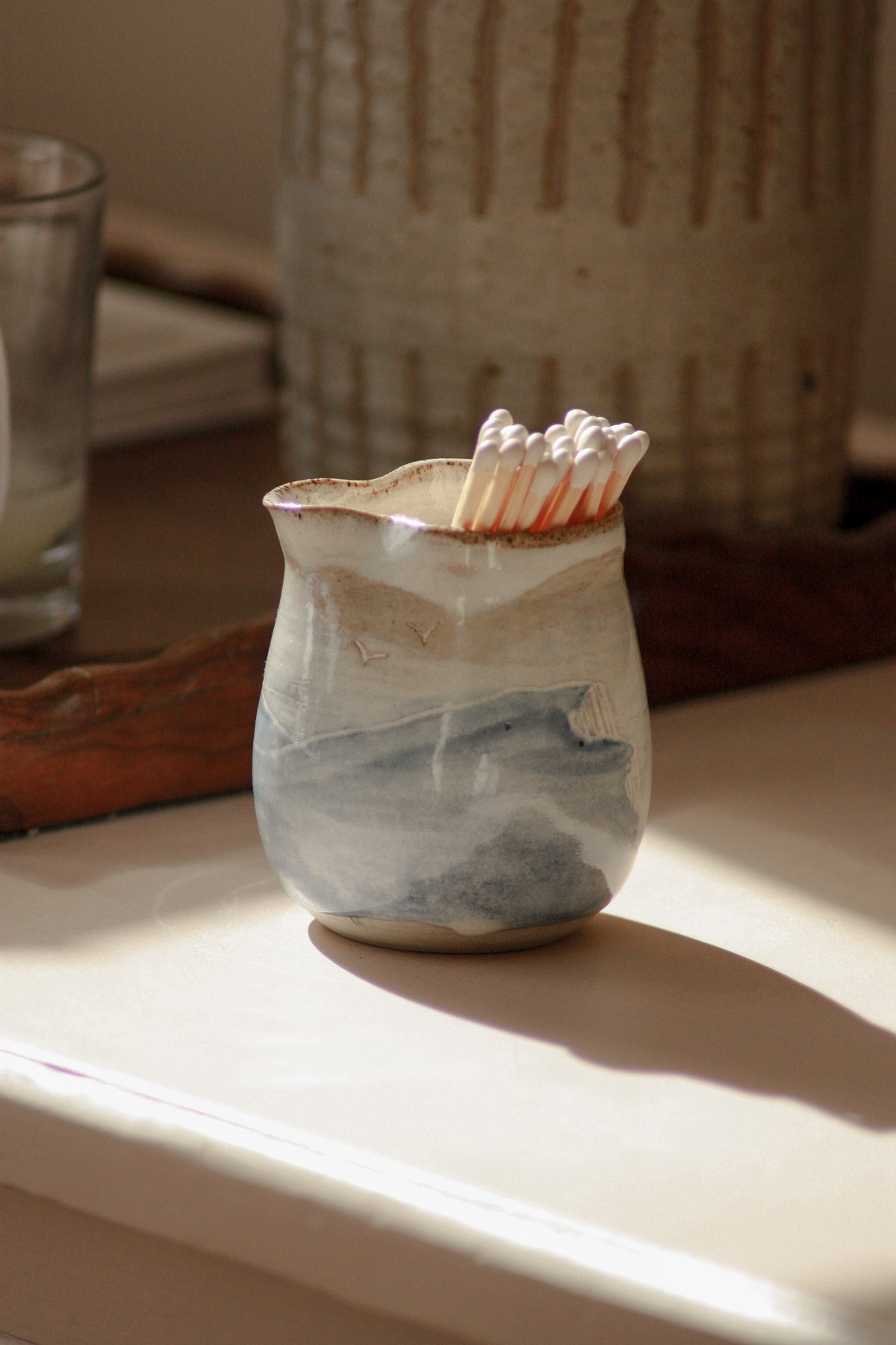 Contemporary studio art pottery cliff scene creamer